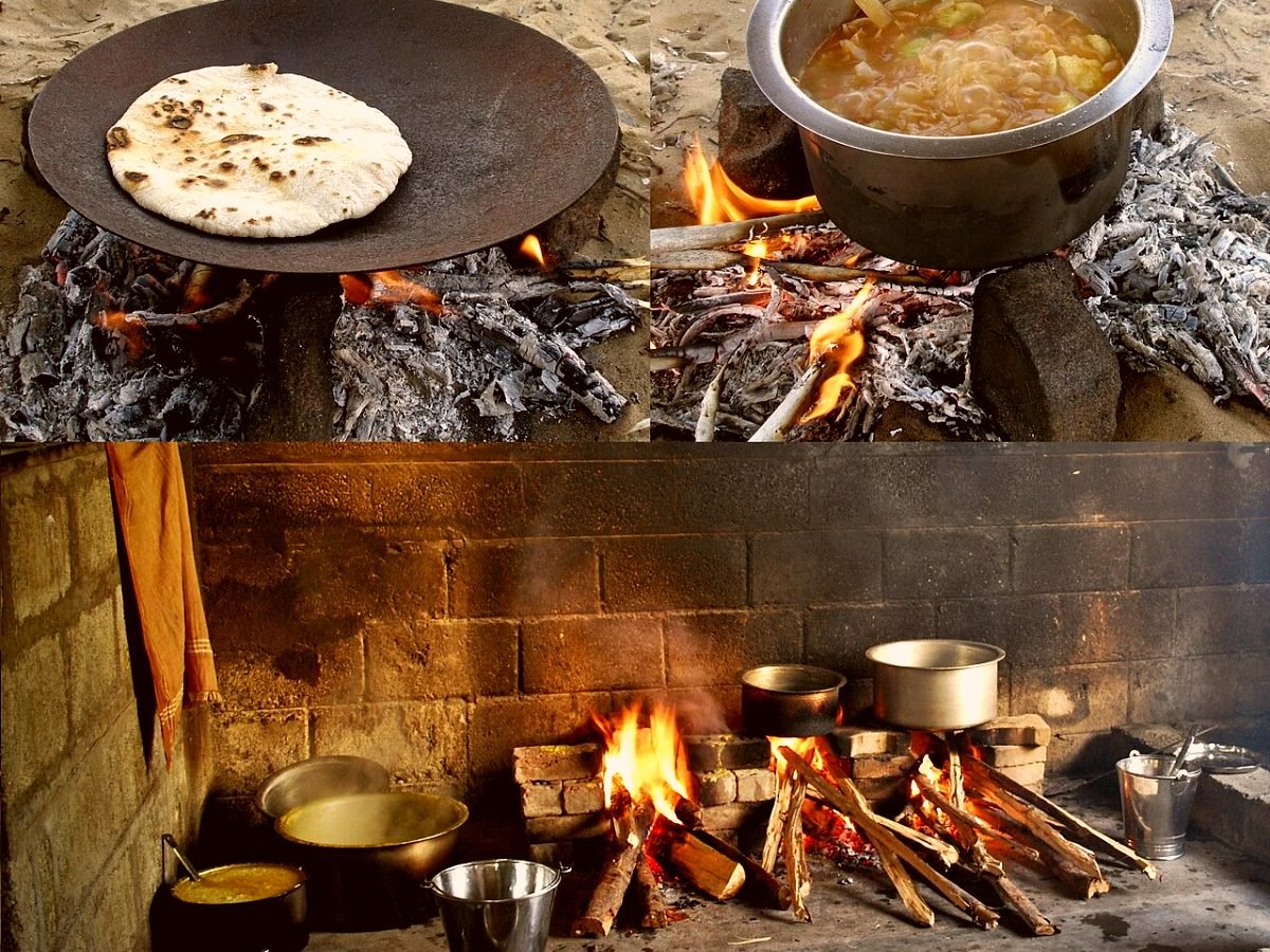 Food cooking over an open wood fire in a traditional Indian kitchen